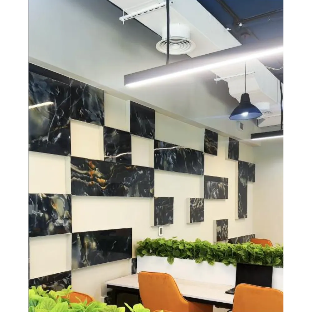 Sophisticated office wall design featuring premium black marble tiles and decorative greenery, enhancing the modern aesthetic and professional ambiance.